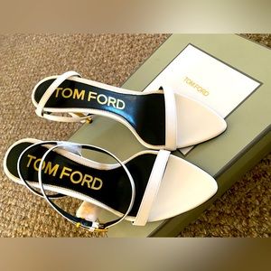 Tom ford heels size 38 1/2. Never worn. In the color white with gold heels.